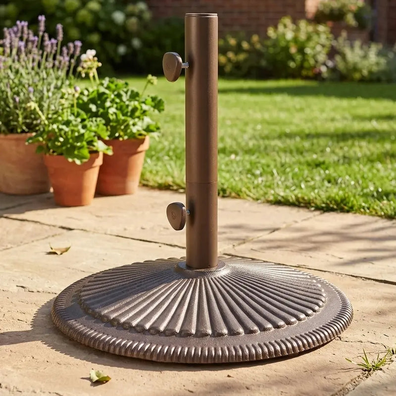 iron patio umbrella stand Sunnydaze 24lb Heavy-Duty Round Cast Base, 18", Black standing near a seating area Treasure Garden 50 lb Classic