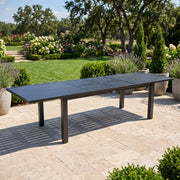 44x90-128 Inch Extension Rectangle Aluminum Slat Black Post Leg Dining Table - The Great Escape
