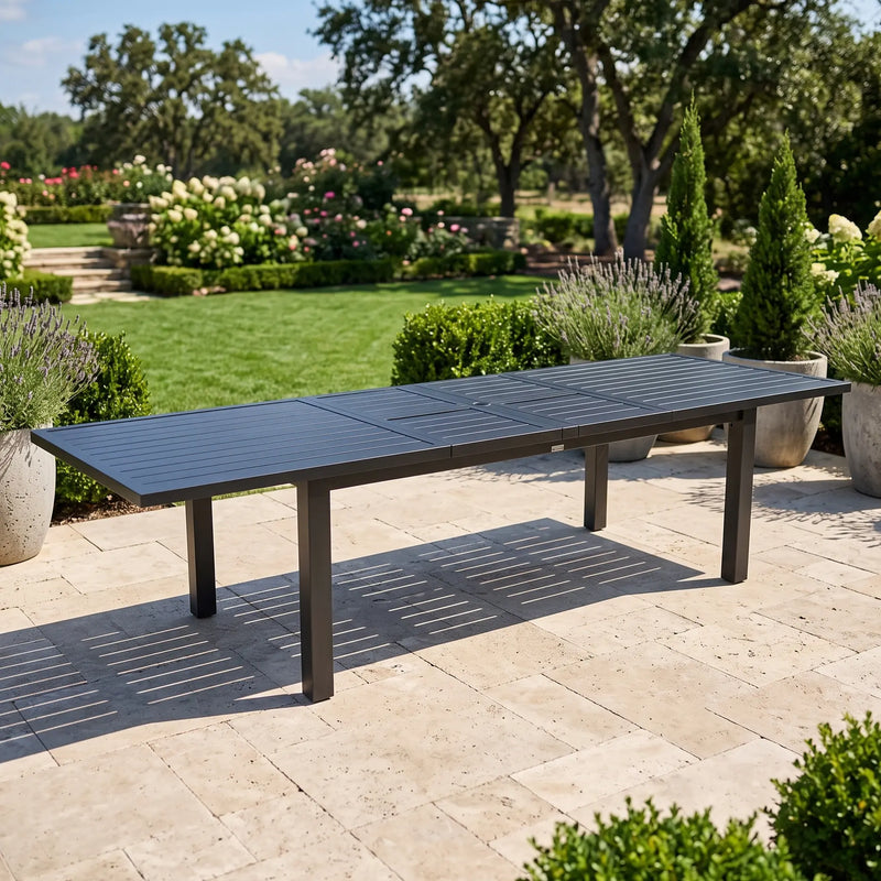 44x90-128 Inch Extension Rectangle Aluminum Slat Black Post Leg Dining Table - The Great Escape
