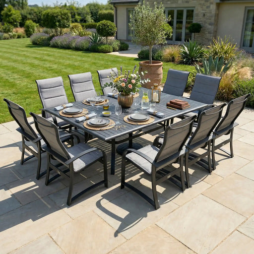 Wakefield 11 Piece Padded Sling Dining Group W/ 60"x84" Rect. Table - The Great Escape