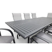 Wakefield 9 Piece Sling Dining Group W/ 44"x112" Rect. Table - The Great Escape