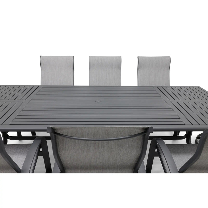 Wakefield 9 Piece Sling Dining Group W/ 44"x112" Rect. Table - The Great Escape